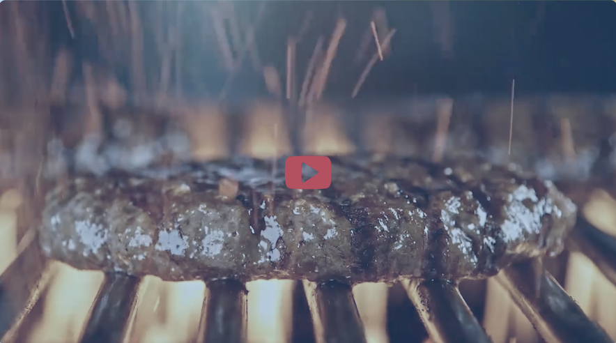 Carl's jr. burger sizzling on grill video